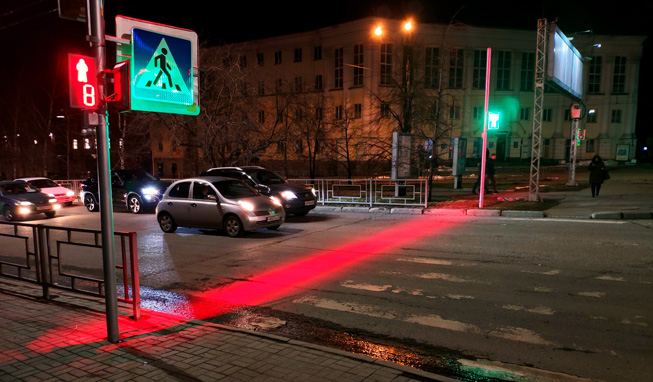 Lossew safety lighting system for pedestrian crossings